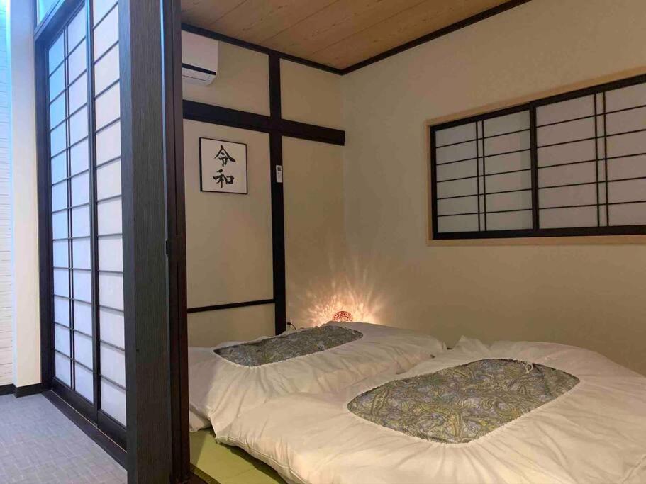 Apartamento 東京民泊 貸し切り一軒家 モダン和風 畳 青砥 上野 プライベート空間 最大8名 Tokio