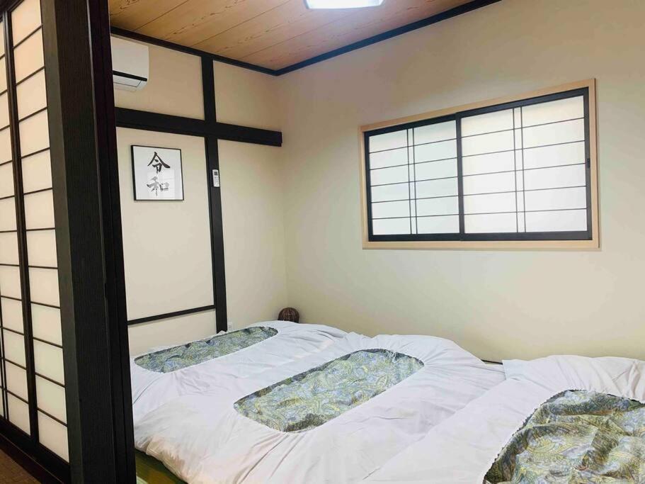 Apartamento 東京民泊 貸し切り一軒家 モダン和風 畳 青砥 上野 プライベート空間 最大8名 Tokio
